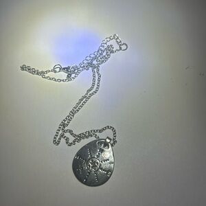 Sterling silver chain with a silver charm